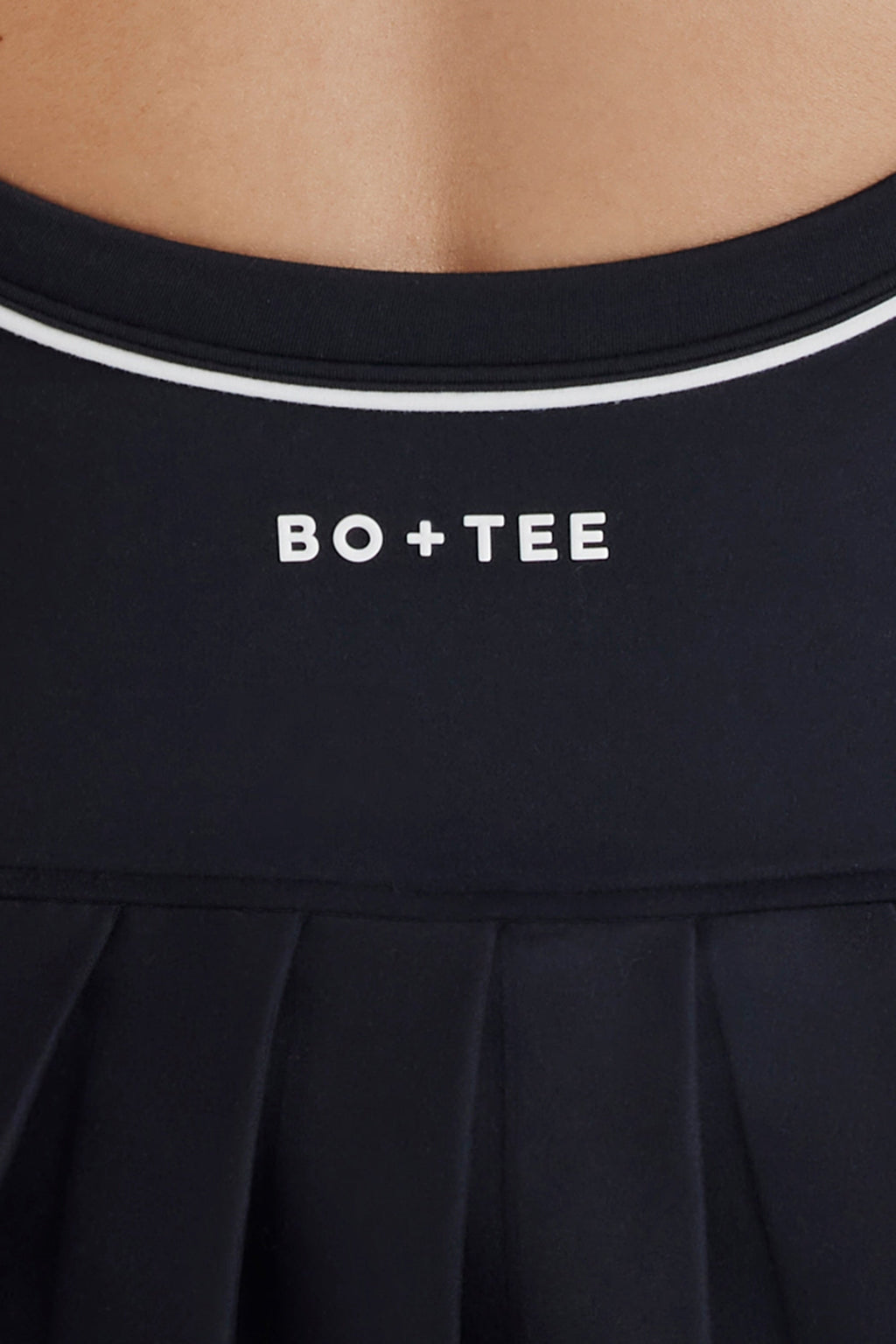 Soft Active Crossback Pleated Tennis Dress in Black